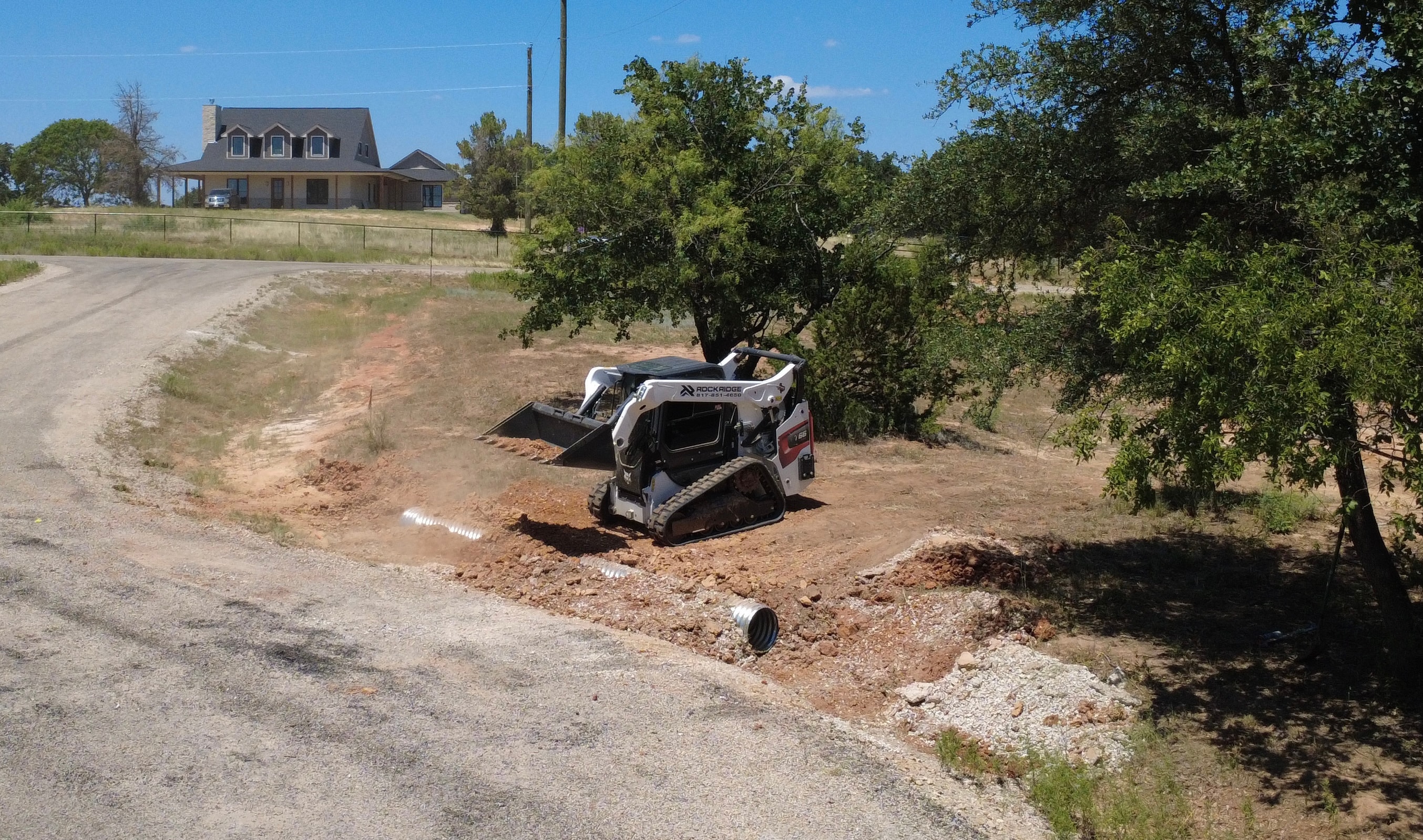 Culvert and drainage installation on a job site